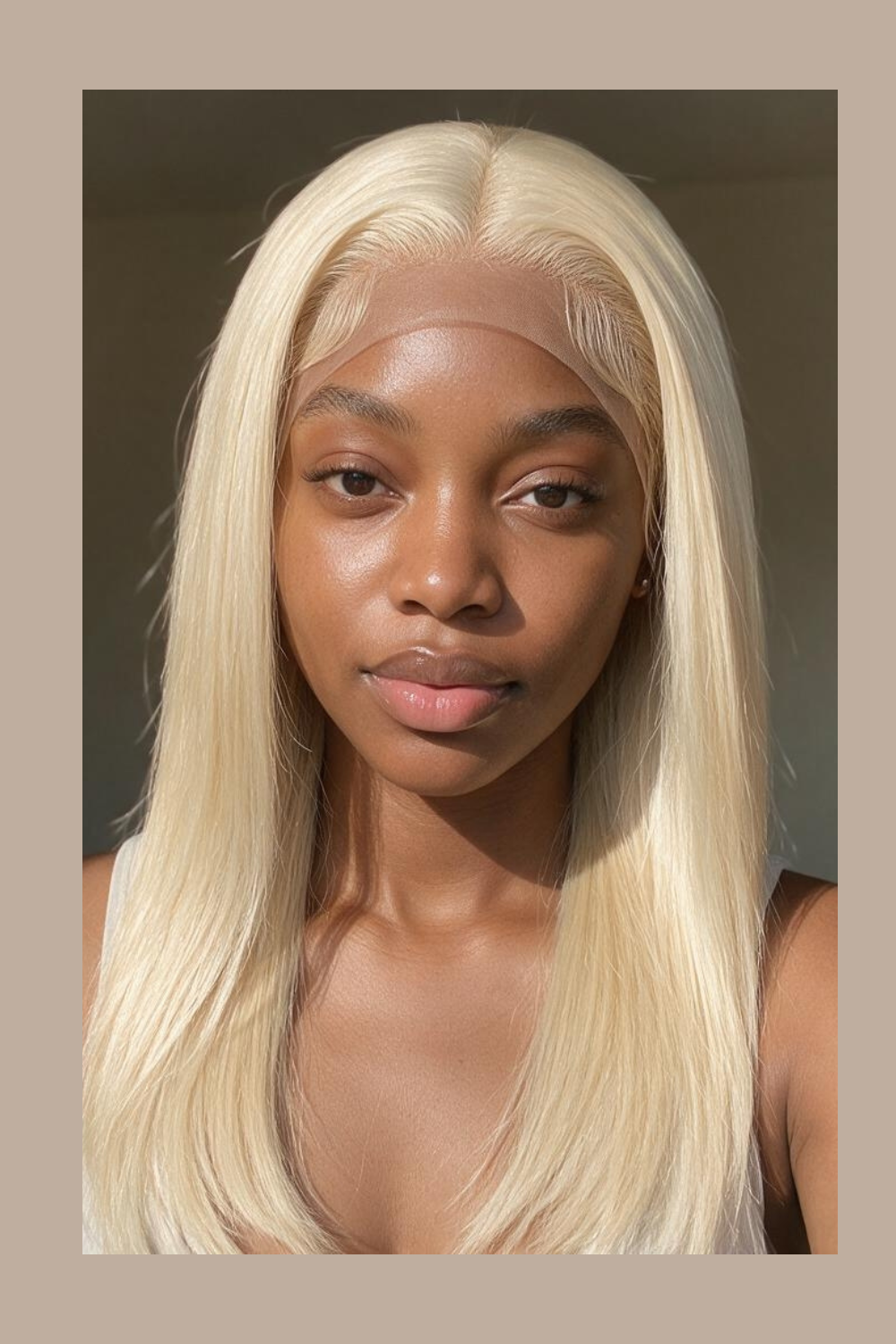 Model wearing the Selene 613 blonde 13x4 HD lace straight wig with a middle part